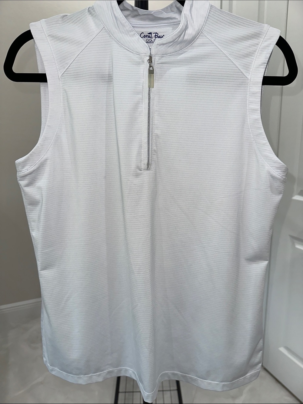 Coral Bay Bundle: White and Blue Sleeveless Zip-Front Golf Polo plus Skort - Picture 2 of 9